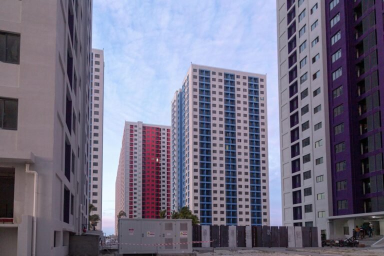 White Concrete Building Under Blue Sky