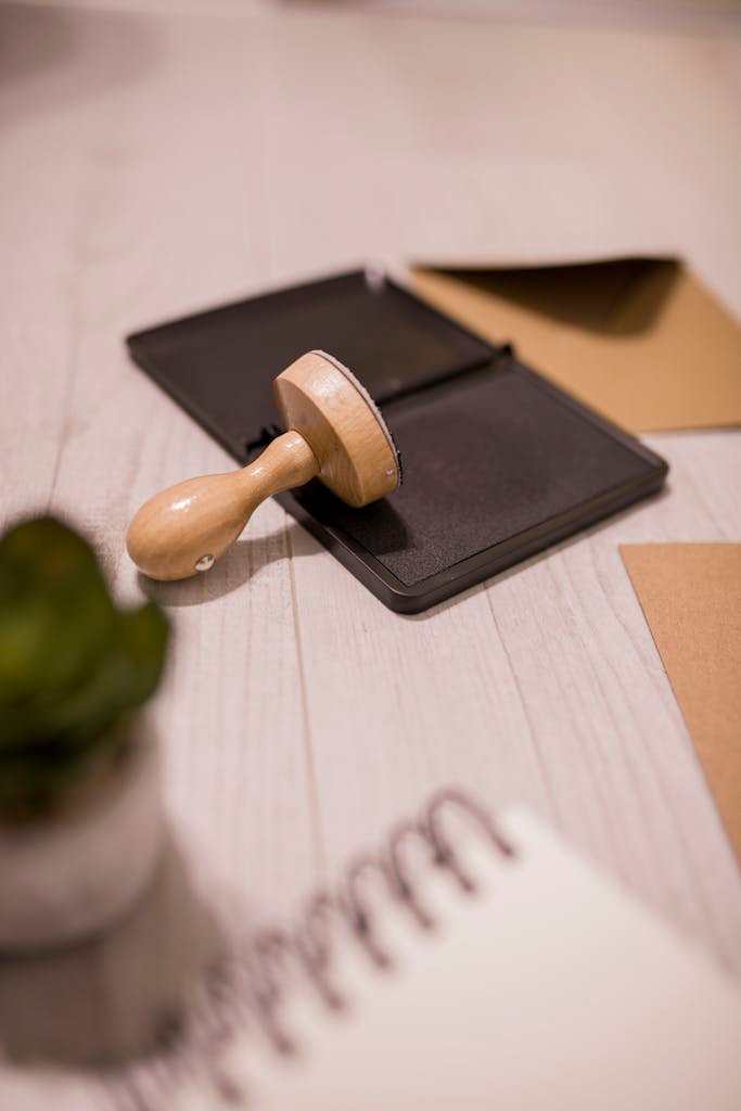 Wooden stamp on ink pad placed on desk